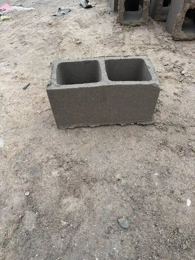 A hollow concrete block with two openings made by Naydo Keystone Ventures in Lagos